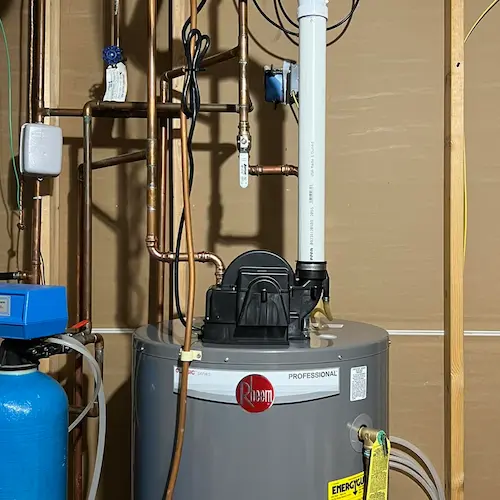 Rheem power vent water heater with PVC vent pipe